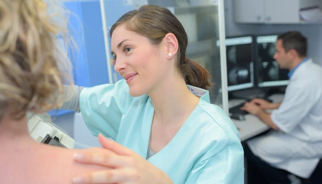 nurse and patient getting mamogram
